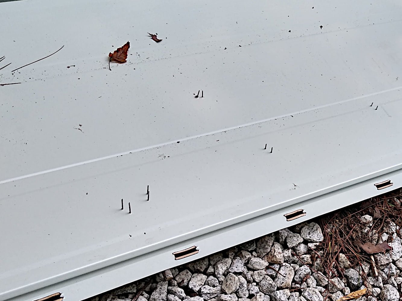 Staples Through Metal Roof Panel