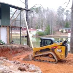 Bobcat digging addition foundation