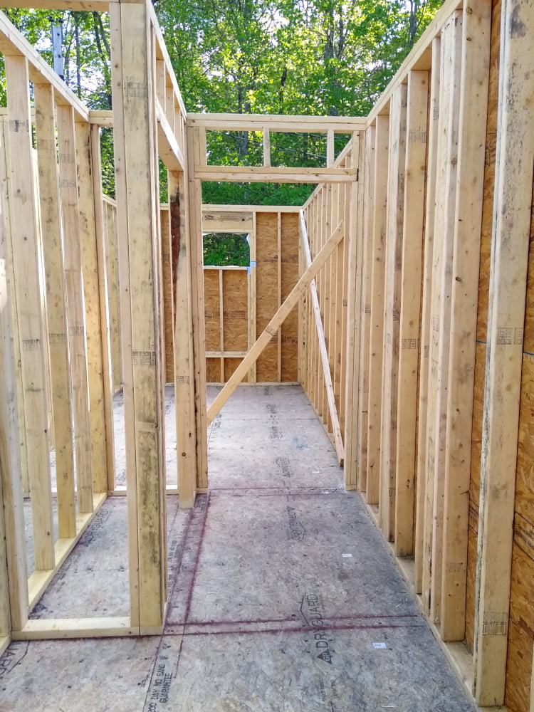 View along entry hall to master bath