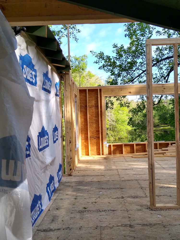 View from entry through studio entry to front wall along mating wall