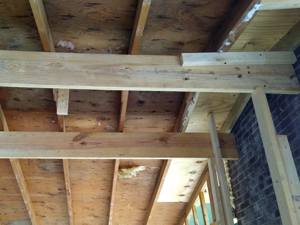 Temporary ridge supports near chimney